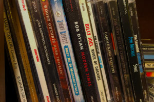 PIcture of CDs for Top 20 Singer-Songwriters post.