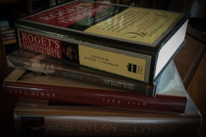 For the Power of Words post. A photo of a thesaurus and lyric books.