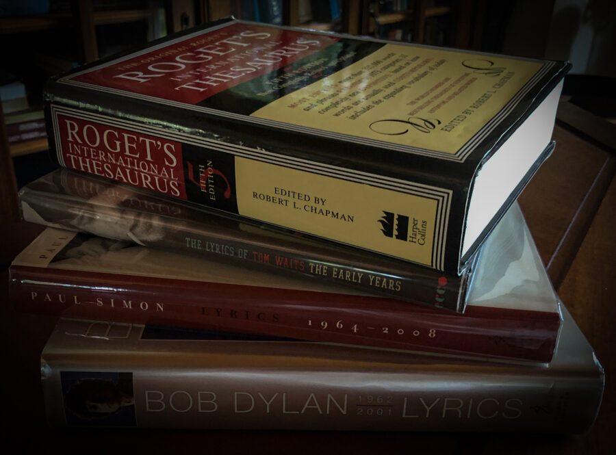 For the Power of Words post. A photo of a thesaurus and lyric books.
