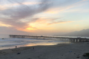 Photo of sunset at Pismo Beach, California. Looking out over the pier.