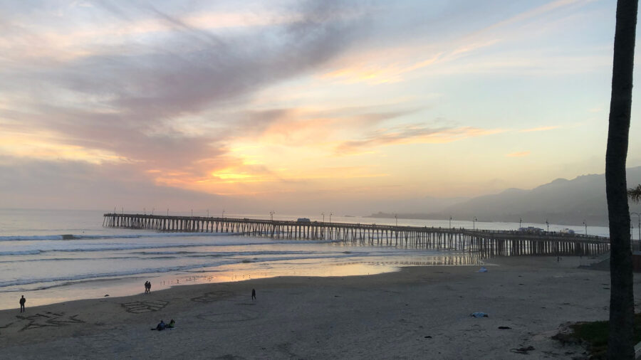 Photo of sunset at Pismo Beach, California. Looking out over the pier.