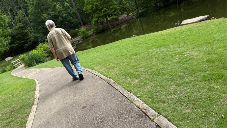 Picture of Gary walking on path.